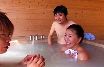 Japanese AV Model tries to hide boobs from strangers in jacuzzi