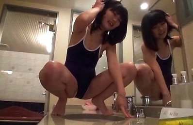 Amateur Asian doll in oiled bath suit licks boner in bathroom
