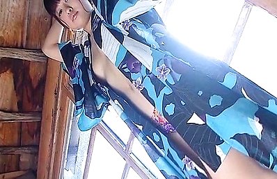 Natsuki Koyama Asian with big knockers takes kimono off on floor