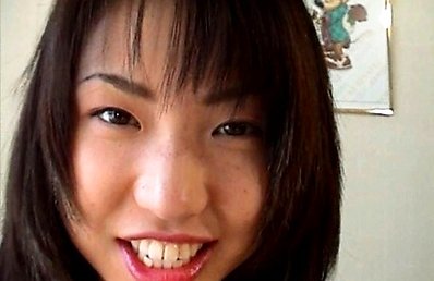 Kaori Asian honey with hot lips smiles while having labia spread