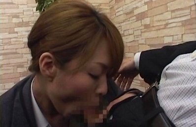 Amateur Asian has shirt unbuttoned and takes boss boner in mouth