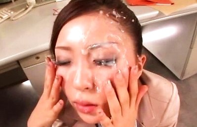 Japanese AV Model in office outfit licks boss dong and rubs it