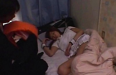 Amateur Asian in tennis outfit caresses her juicy boobies in bed