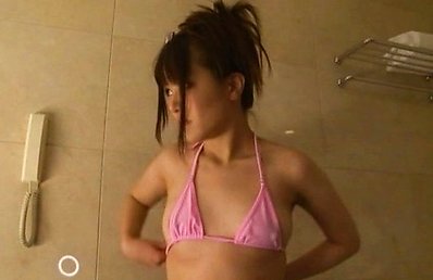 Japanese AV Model takes pink bath suit off to shower her boobies