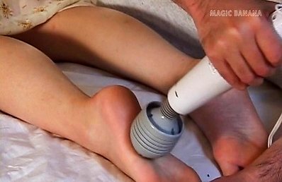 Runa Akasaka Asian is teased with vibrator on legs over dress