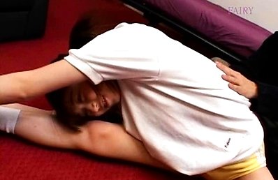 Usagi Nakayama Asian in sports outfit is helped to do exercises