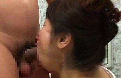 Japanese AV Model gives blowjob in bathroom while touching balls