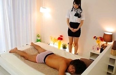 Nozomi Aiuchi turns on the man she has to massage. She has the hairy pussy licked by him and she takes his dick in a deepthroat. Fingered and fucked i