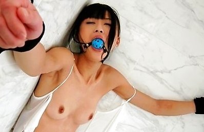 Japanese teen Chika is bound in the shower with a horny guy teasing her body