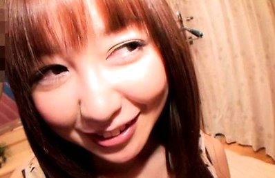 Japanese AV Model smiles while showing some ass under shorts