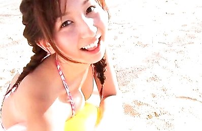 Riho Iida Asian with big cans plays tennis and with big balls