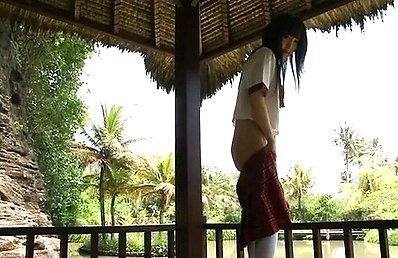 Megumi Aisaka Asian takes skirt off and shows ass cheeks outdoor