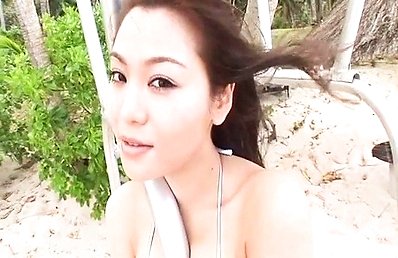 Yoko Matsugane Asian rubs bat between her nasty boobs in bra