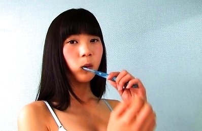 Luna Mizuki Asian in pajamas shows sexy legs while playing in bed