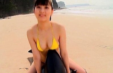 Kijima Yuri Asian with playful tits has pussy in bikini in sand