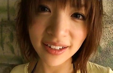 Ryoko Tanaka Asian rubs her twat in bikini of bar and hides tits