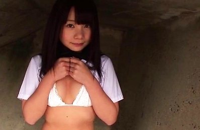 Mana Asian doll takes school uniform and shows curves outdoor