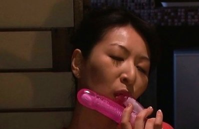 Hitomi Oohashi Asian busty licks vibrator and fucks cunt with it