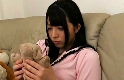 Ai Uehara Asian plays with toy and with her big boobs over bra
