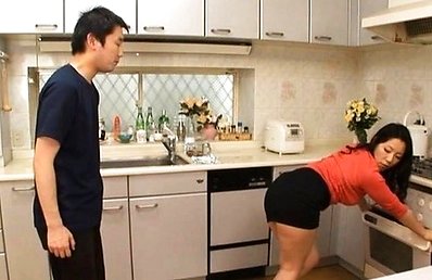 Ayane Asakura Asian babe takes off skirt in kitchen exposing ass